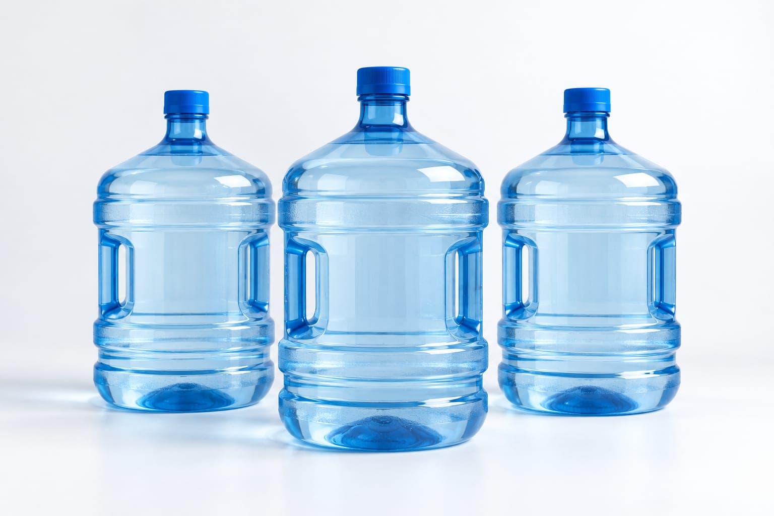 Sealed five-gallon water bottles ready for delivery to a customer's home